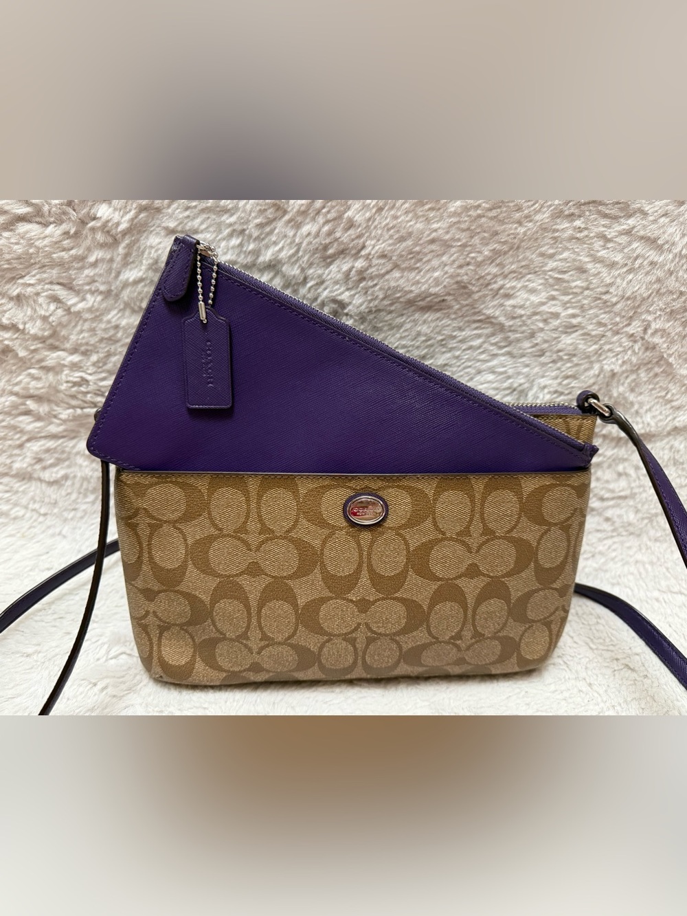 Coach Peyton Signature Swing pack Canvas Crossbody bag in Tan with Purple Trim